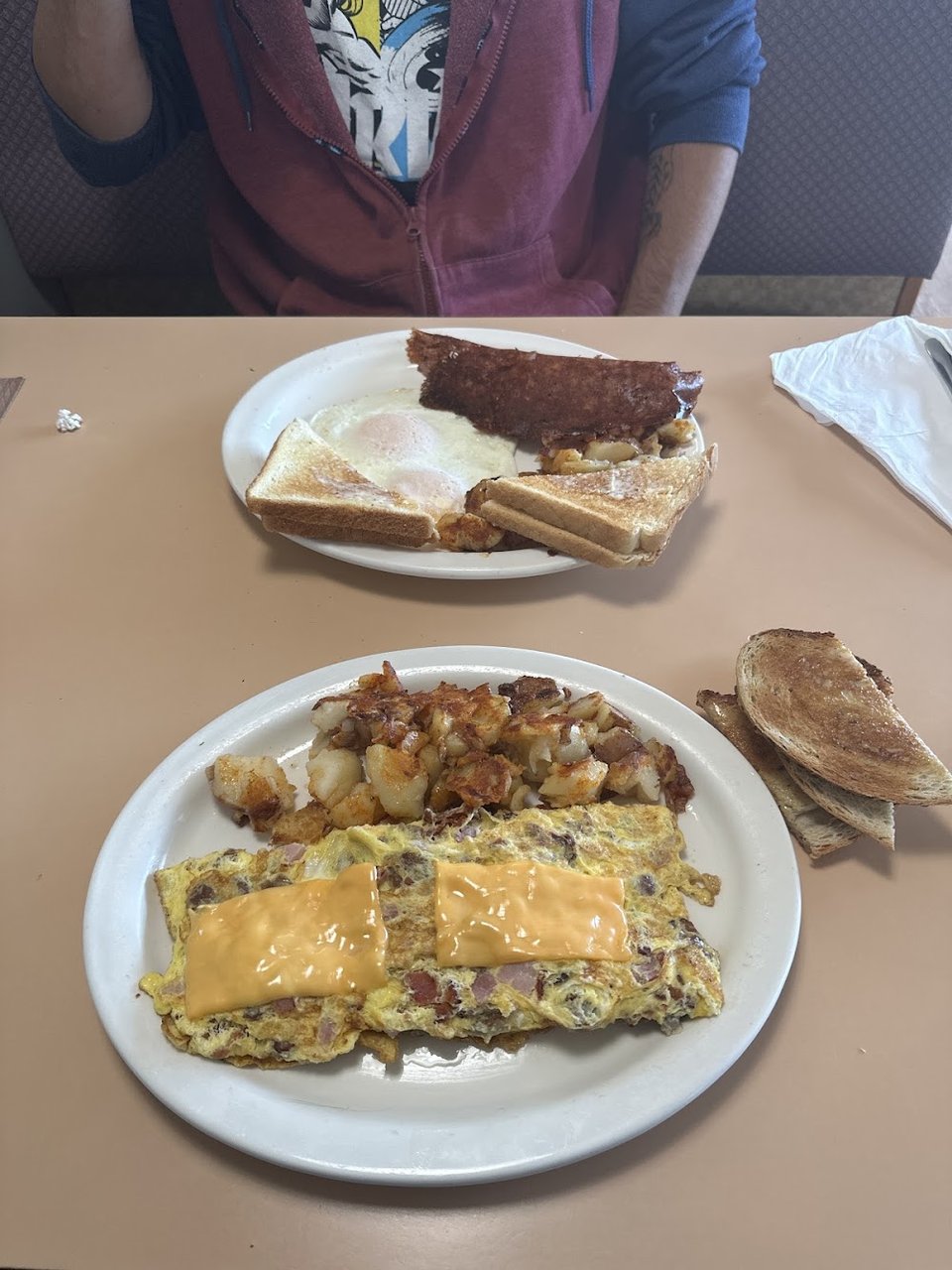 Printed menu with breakfast and dinner choices.